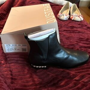 Black Booties with a pearl heel accent size 9
